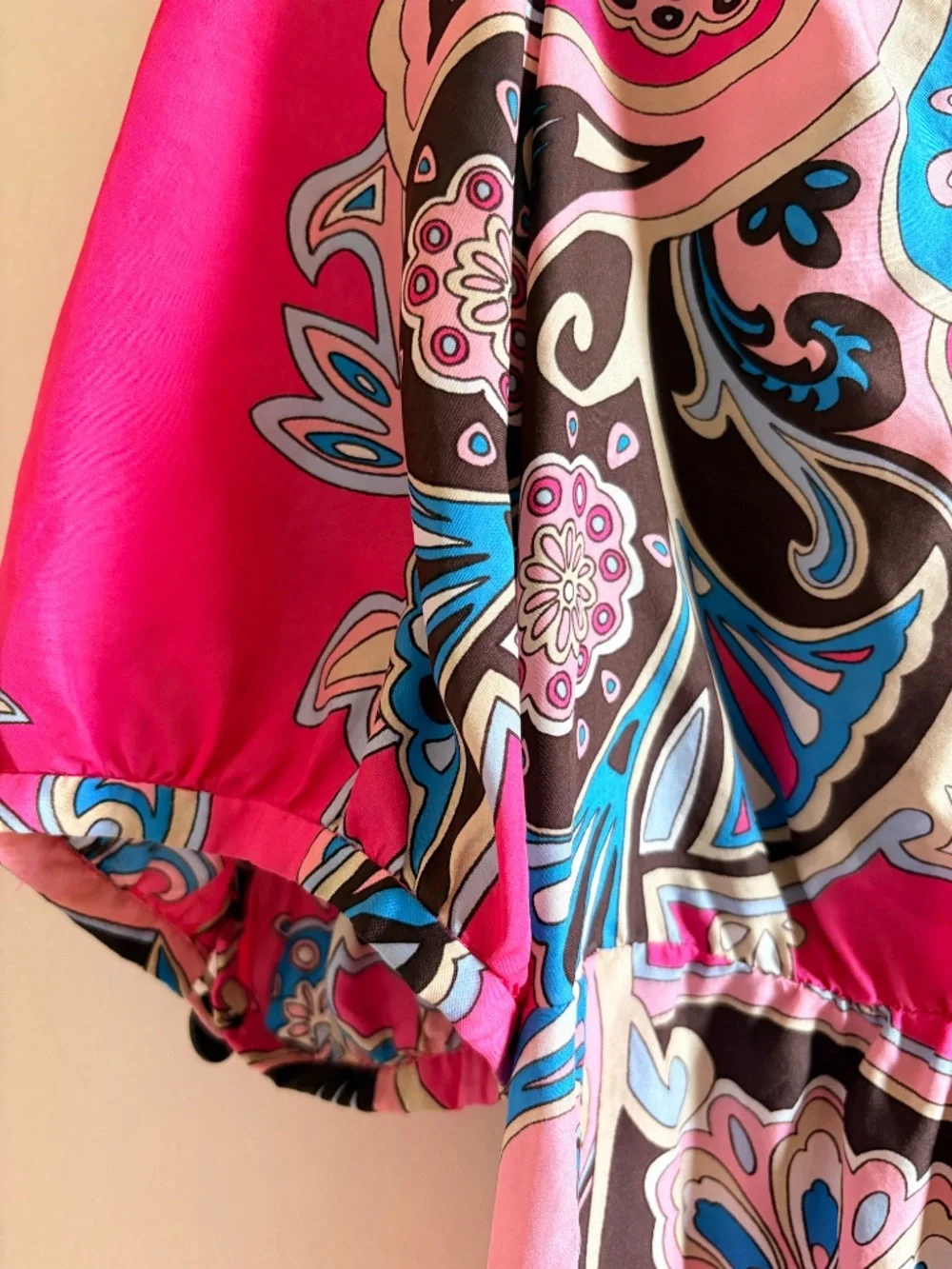100% Silk ruffle-neck blouse.